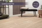 Promotiebeeld van Landhuis Click PVC met brede planken bij een bankje.